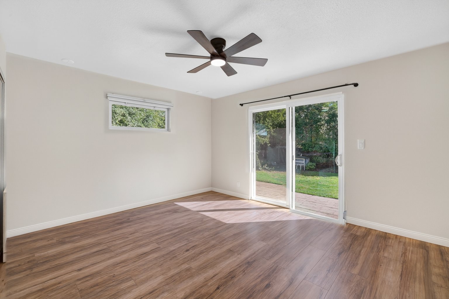 The bedroom shown empty, digitally recreated from the staged photo